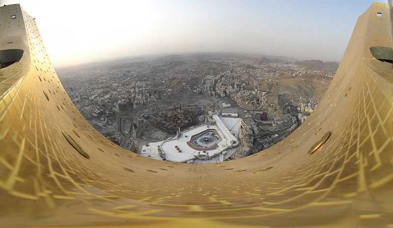 panoramic overview of the city of Makkah (Saudi Arabia) taken from the crescent located at the top of Abraj-Al-Bait-Towers in about 585m height. It was built from 67 single photos. It covers about 180° from west over north to east. Photo by Wurzelgnohm.
